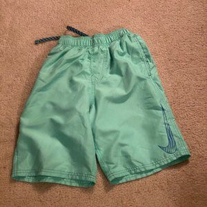 Neon green Nike swim shorts